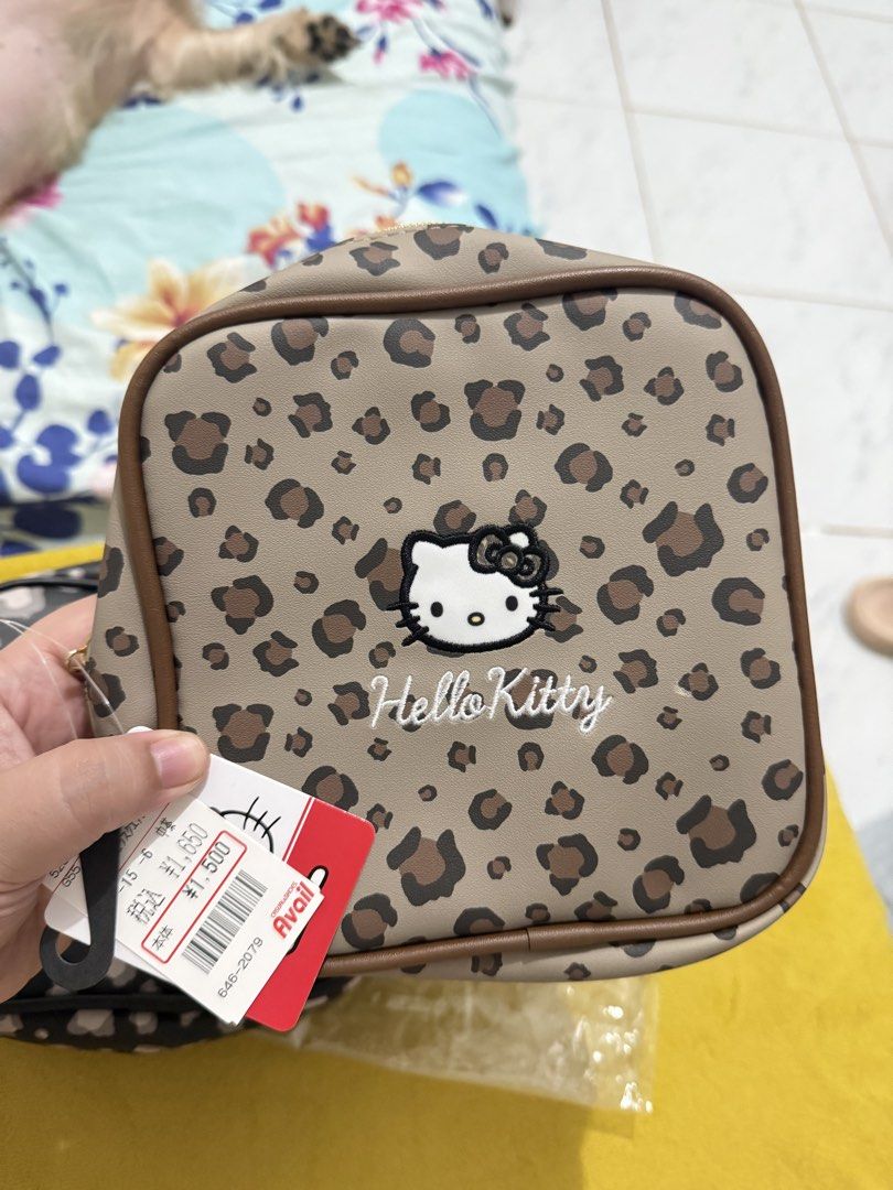 HELLO KITTY POUCH (2pcs) (Category: Purses & Pouches) located in Quezon City. Submitted by sheysheyn22 (Listing ID 1460112470, Image 2). Description: FOR SALE! 🖌️HELLO KITTY POUCH (2pcs) Price Amount- ₱1350.00 Original Price- ¥1650.00 each Brown - Brand New with tag. Black- used item with minimal flaws (see pictures) This is from Japan (Avail Store). Check last pic. for reference 📍Location: Quezon City Payment First before I ship the item. MOP-