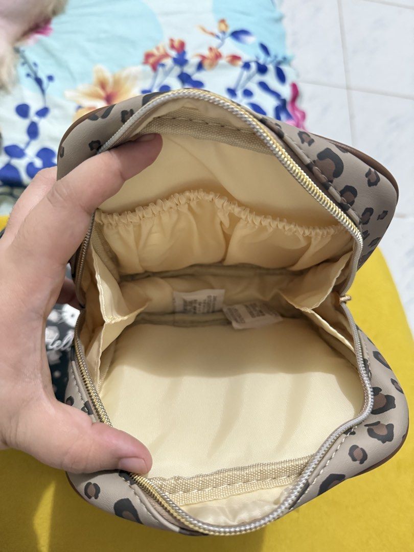 HELLO KITTY POUCH (2pcs) (Category: Purses & Pouches) located in Quezon City. Submitted by sheysheyn22 (Listing ID 1460112470, Image 3). Description: FOR SALE! 🖌️HELLO KITTY POUCH (2pcs) Price Amount- ₱1350.00 Original Price- ¥1650.00 each Brown - Brand New with tag. Black- used item with minimal flaws (see pictures) This is from Japan (Avail Store). Check last pic. for reference 📍Location: Quezon City Payment First before I ship the item. MOP-