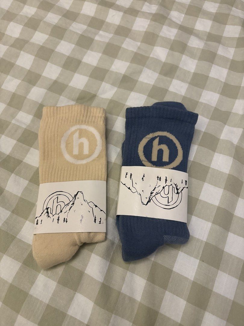 Hidden NY Socks - Beige & Blue (Category: Socks) located in Paranaque City. Submitted by max_bully014 (Listing ID 1460188359, Image 1). Description: - Two pairs of socks from Hidden NY - Colors: Light Beige and Dusty Blue - Design: Mountain graphic with 'h' logo - Material: 80% Cotton, 20% Nylon - Ideal for: Everyday wear.