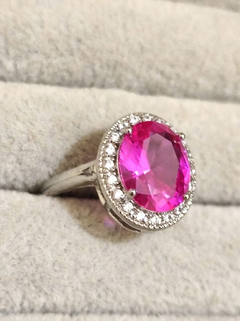 HIGH QUALITY 3 carat Natural Pink Ruby Simple Oval Solitaire Ring (UV REACTIVE!) (Category: Rings) located in Mandaluyong City. Submitted by allaboutgemsandco (Listing ID 1460110454, Image 3). Description: HIGH QUALITY 3 carat Natural Pink Ruby Simple Oval Solitaire Ring (UV REACTIVE!) Stone Size:12mmx9.9mm Ring Size: Adjustable Price: Php 1200 add shipping fee for less than Php 1000 REASON FOR SALE: Clearing out my collection. Stone sourced from