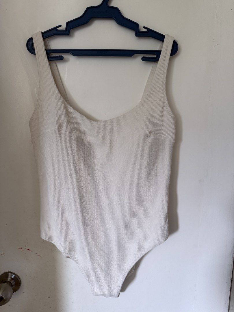 H&M White Textured Recycled Polyester Swimsuit Size M (Category: Bikinis & Swimsuits) located in Cebu City. Submitted by adrieyen (Listing ID 1460181206, Image 1). Description: Original Price: 1,490.00 RFS: Wrong size - Brand: H&M - Style: White textured one-piece swimsuit - Material: Shell 96% recycled polyester, Lining 87% recycled polyester - Features: Scoop neck, low back - Size: M - Condition: Brand new with tags attached, never worn.