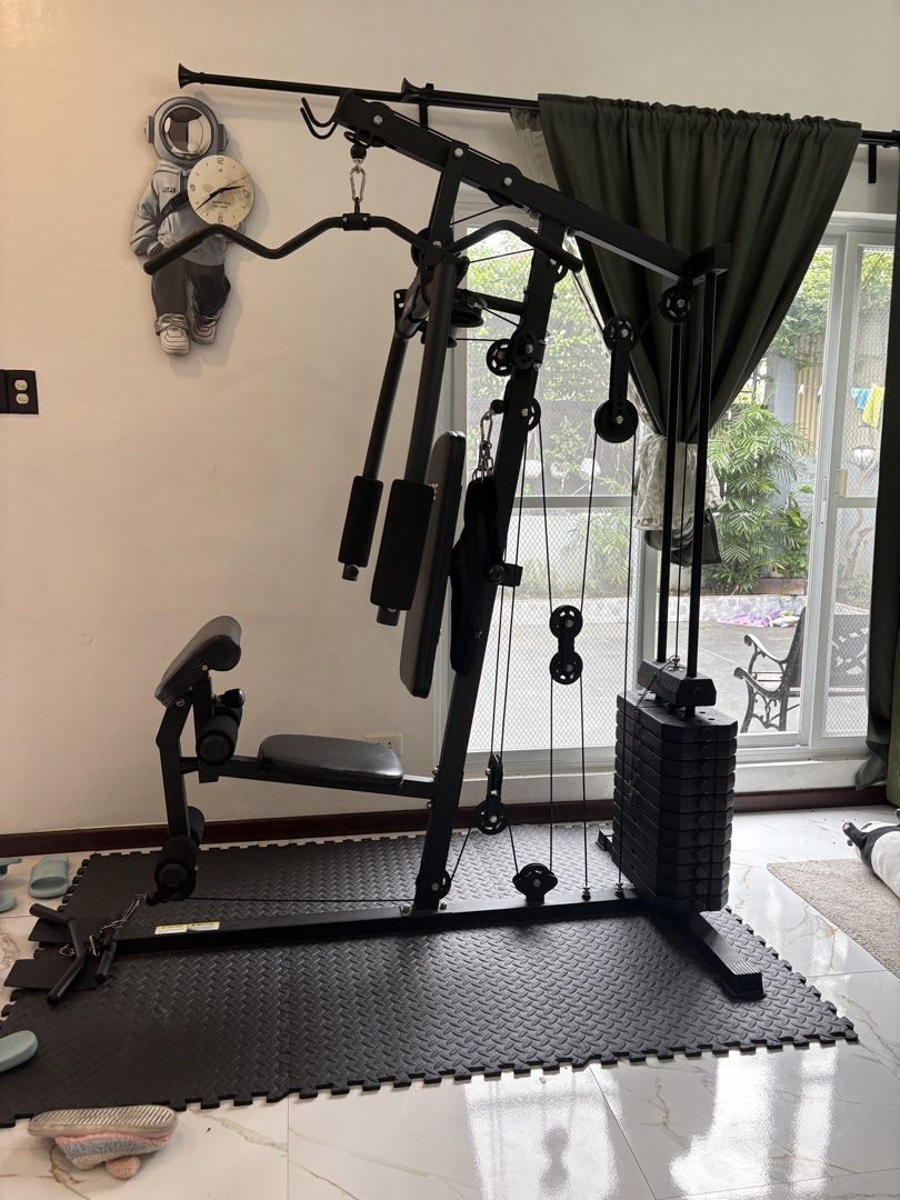 Home Gym Machine with Weight Stack (Category: Cardio & Fitness Machines) located in Quezon City. Submitted by ilonajanecabutotan49.49 (Listing ID 1460126467, Image 3). Description: - Complete home gym setup - Includes weight stack for resistance training - Suitable for lat pulldowns, chest presses, leg extensions, and more - Compact design, ideal for home use - Build strength and tone muscles - Ready for your home workouts.