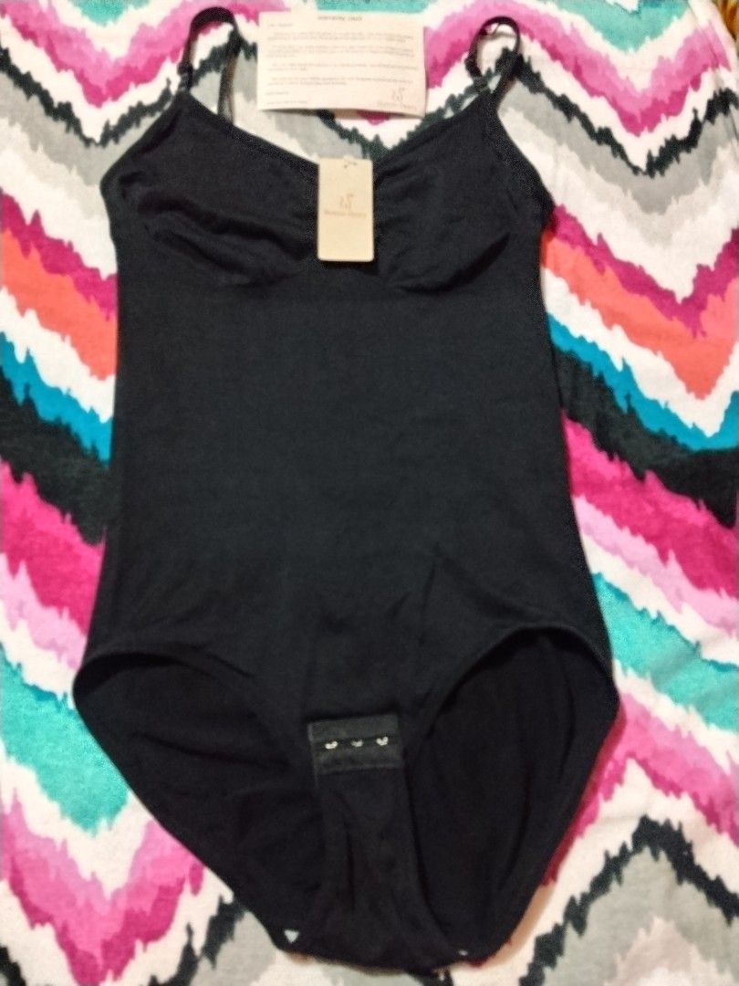 Hottie Diary Black Bodysuit Shapewear (Category: Undergarments & Loungewear) located in Las Pinas. Submitted by budgetbuddies (Listing ID 1460278280, Image 3). Description: - Brand: Hottie Diary - Color: Black - Features: Adjustable straps, hook-and-eye closure at the bottom - Benefits: Offers shaping and smoothing, perfect for layering - Condition: Brand new with original tags and warranty card.