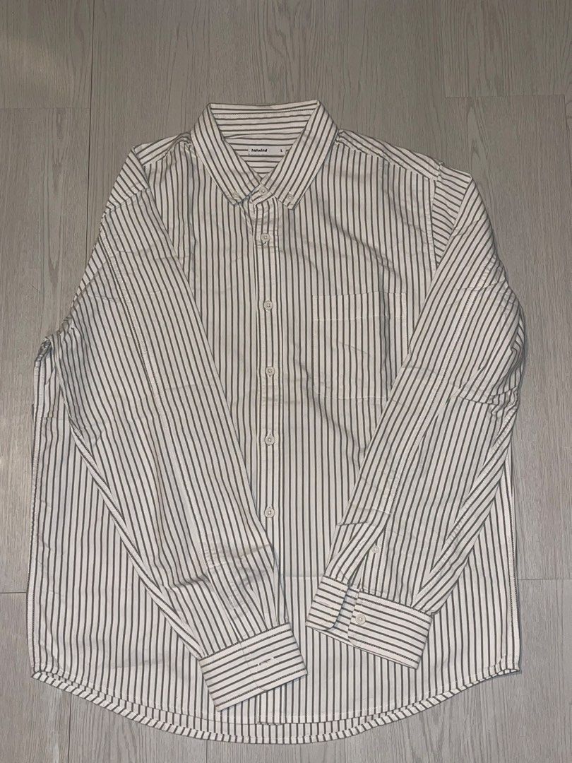 Hotwind Striped Button-Down Shirt Size L (Category: Tshirts & Polo Shirts ) located in San Juan City. Submitted by shop.wels (Listing ID 1460130608, Image 2). Description: - Classic button-down shirt from Hotwind - Features thin vertical stripes - Chest pocket - Button-down collar - Size L - Ideal for casual or smart-casual wear - Easily pairs with jeans or trousers.