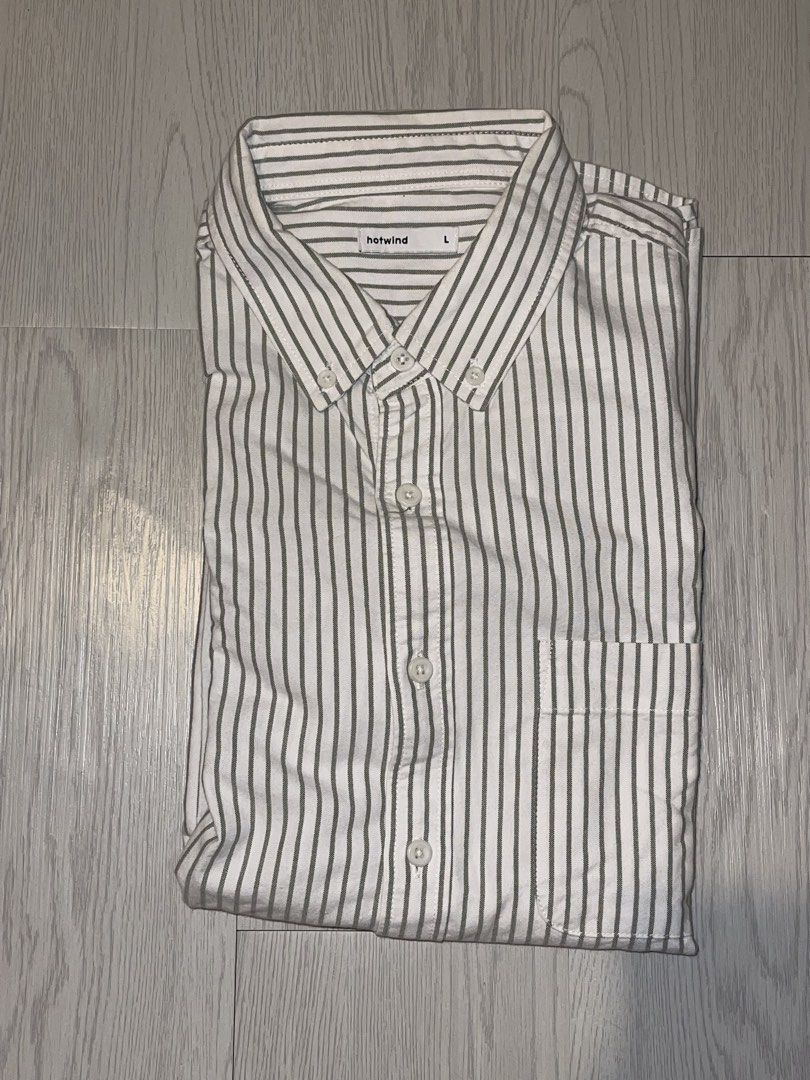 Hotwind Striped Button-Down Shirt Size L (Category: Tshirts & Polo Shirts ) located in San Juan City. Submitted by shop.wels (Listing ID 1460130608, Image 1). Description: - Classic button-down shirt from Hotwind - Features thin vertical stripes - Chest pocket - Button-down collar - Size L - Ideal for casual or smart-casual wear - Easily pairs with jeans or trousers.
