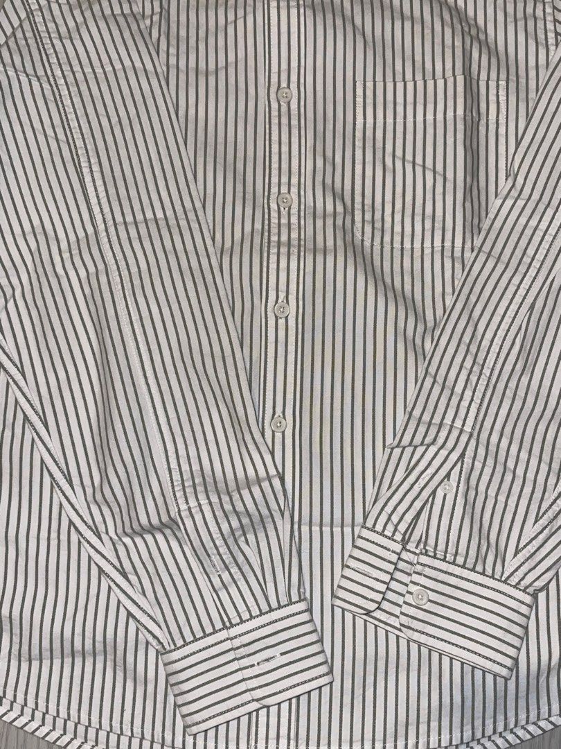 Hotwind Striped Button-Down Shirt Size L (Category: Tshirts & Polo Shirts ) located in San Juan City. Submitted by shop.wels (Listing ID 1460130608, Image 3). Description: - Classic button-down shirt from Hotwind - Features thin vertical stripes - Chest pocket - Button-down collar - Size L - Ideal for casual or smart-casual wear - Easily pairs with jeans or trousers.