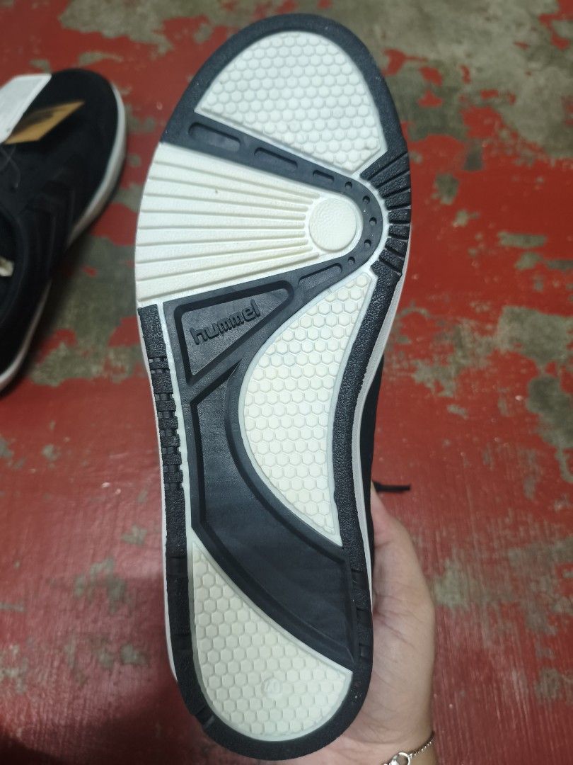 Hummel Black Sneakers (Category: Sneakers) located in Manila. Submitted by matte_white (Listing ID 1460165835, Image 3). Description: - Brand: Hummel - Color: Black - Style: Lace-up sneakers - Upper Material: Mesh and synthetic - Sole Material: Rubber - Origin: Made in Turkey - Size: EU 40 / UK 7 / US 7.5 / JPN 25.5 - Condition: Brand new with original tags.