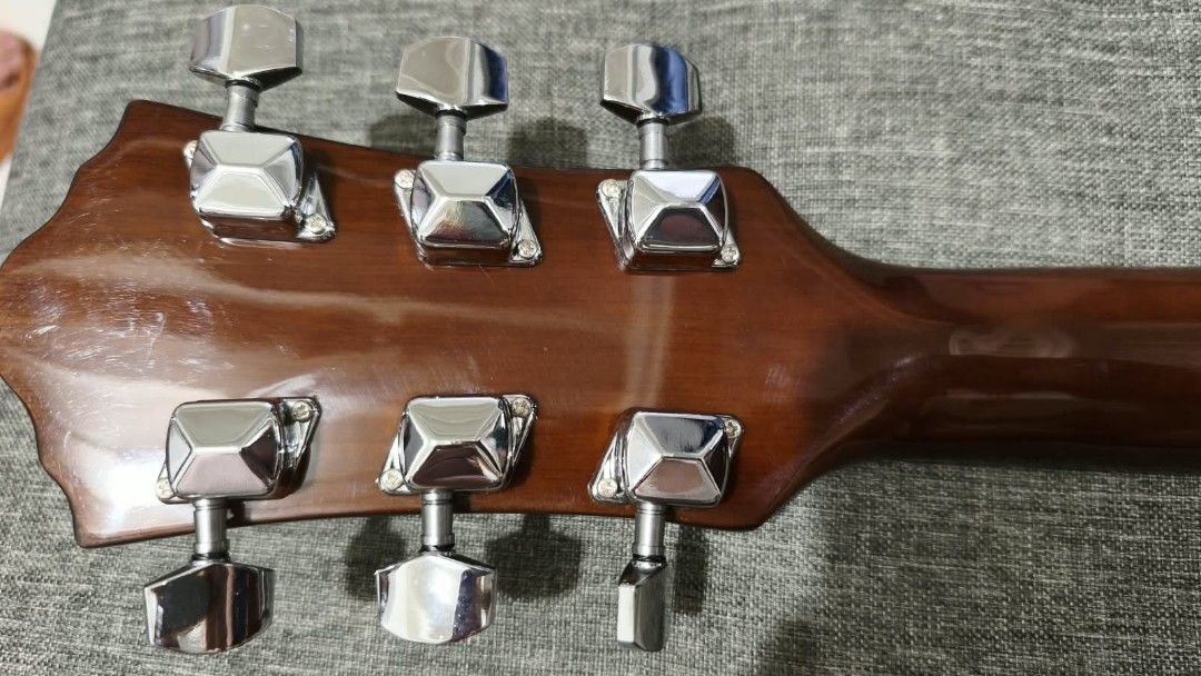 Ibanez Acoustic Guitar (Category: Musical Instruments) located in Manila. Submitted by ejayrocks07 (Listing ID 1460127456, Image 2). Description: - Ibanez Acoustic Guitar - Natural wood finish on body and neck - 6 strings included - Silver-toned tuning pegs - Ideal for beginners or as a reliable acoustic - Ready for strumming.