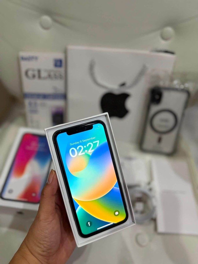 Iphone x 64gb (Category: iPhone X Series) located in Caloocan City. Submitted by JennMT (Listing ID 1460127110, Image 3). Description: iPhone x 64gb- 6k only ✅any sim (factory unlock) data working ✅wifi working ✅unli reset ✅90 % to 100 % ✅camera front & back working ✅16.8 ios Just add 299 for this set!! Case/TG/iphone paper bag/box/charger/headset.