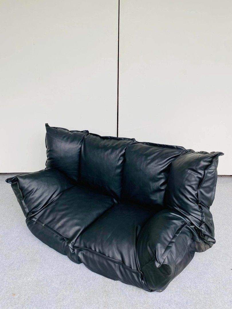 "JAPAN SURPLUS" BLACK LEATHER FLOOR SOFA BED (Category: Announcements) located in Bustos. Submitted by mherzkie05 (Listing ID 1460237939, Image 3). Description: "JAPAN SURPLUS" BLACK LEATHER FLOOR SOFA BED SIZE: 60L" x 42W-19W" x 23H" inches (AS-IS ITEM) IN GOOD CONDITION.