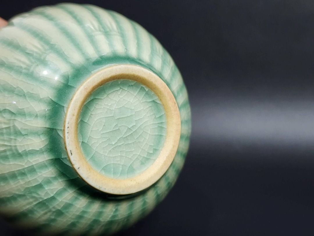 Japanese Celadon Ceramic Bowl — Crackle Glaze (Category: Vases & Decorative Bowls) located in Quezon City. Submitted by lacasetta (Listing ID 1460247637, Image 2). Description: Elegant light-green ceramic bowl with a beautifully developed crackle glaze and vertical fluted relief, evoking the graceful forms of lotus petals and traditional Japanese celadon (seiji). Its soft celadon tone, organic ribbed silhouette, and delicate surface character cre