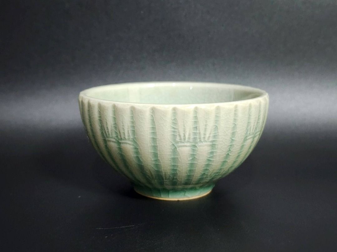 Japanese Celadon Ceramic Bowl — Crackle Glaze (Category: Vases & Decorative Bowls) located in Quezon City. Submitted by lacasetta (Listing ID 1460247637, Image 1). Description: Elegant light-green ceramic bowl with a beautifully developed crackle glaze and vertical fluted relief, evoking the graceful forms of lotus petals and traditional Japanese celadon (seiji). Its soft celadon tone, organic ribbed silhouette, and delicate surface character cre