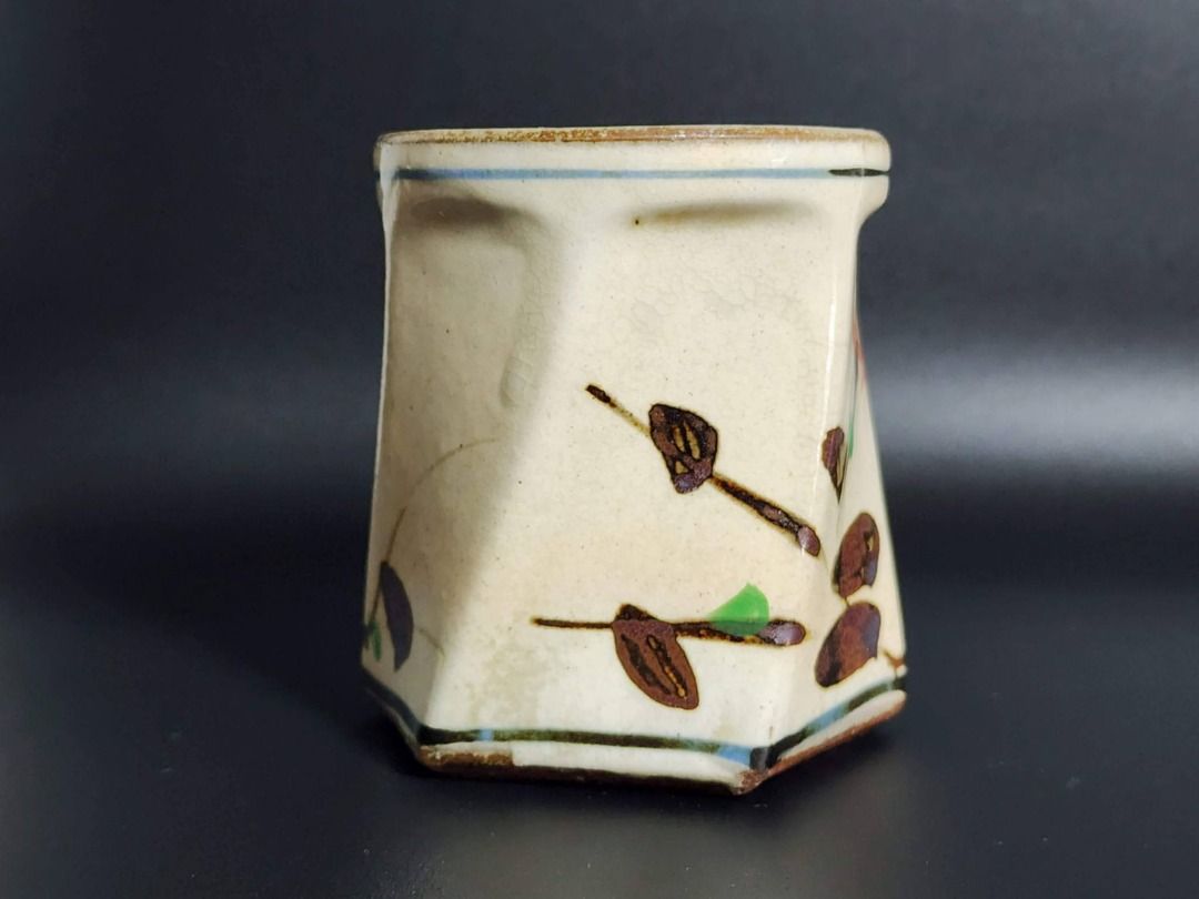 Japanese Mashiko-Style Stoneware Cup (Category: Other Kitchenware & Tableware) located in Quezon City. Submitted by lacasetta (Listing ID 1460236218, Image 3). Description: Japanese Mashiko-style stoneware cup with a faceted form, warm cream glaze, and expressive hand-painted floral decoration in earthy orange, brown and green. Finished with an impressed potter’s seal to the base. A quietly sophisticated example of Japanese studio pottery, appeal