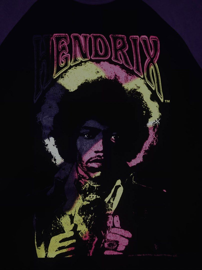 Jimi Hendrix Authentic Long Sleeve Raglan T-Shirt (Category: Tshirts & Polo Shirts ) located in Santa Rosa. Submitted by dreicobsthrift (Listing ID 1460274708, Image 2). Description: JIMMY HENDRIX LONG SLEEVE best fit Medium (Small on tag) L27.5 W20 Excellent condition Color rate: 9.8/10 or better Mine: 399+sf - Long sleeve raglan tee - Features a cool Jimi Hendrix graphic print - Black body with contrasting purple sleeves - Comfortable cotton-po