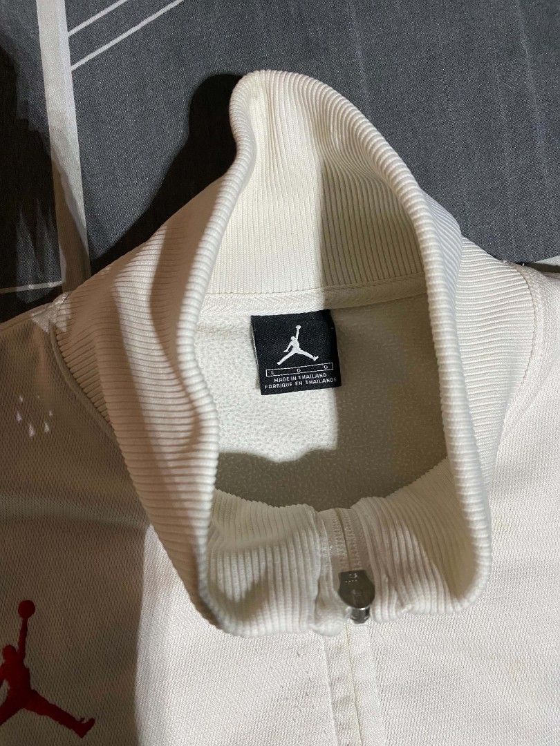 Jordan Track Jacket White Black Red (Category: Coats, Jackets and Outerwear) located in Manila. Submitted by raymondrob54698 (Listing ID 1460213518, Image 3). Description: - Cool Jordan track jacket - White, black, and red colorway - Features Jumpman logo on the front - Jordan text on the back - Zipper closure - Ribbed cuffs and hem - Made in Thailand - Great for casual wear or sports 23x30.