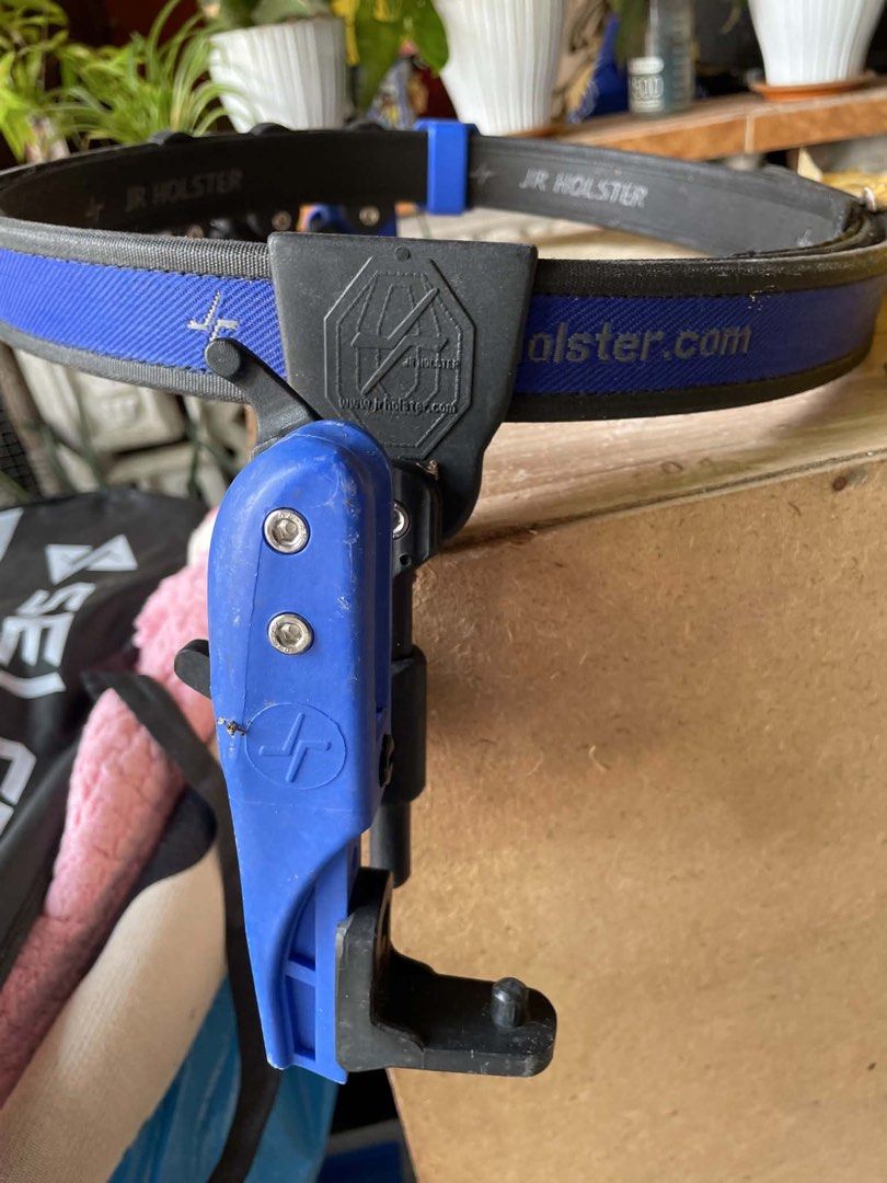JR Holster Competition Belt with Multiple Holsters (Category: Other Sports Equipment and Supplies) located in Panabo. Submitted by drenroyal (Listing ID 1460301465, Image 3). Description: - JR Holster Competition Belt - Includes: 3 Magazine Holders (2 Red, 1 Blue) - Includes: 1 Holster (Blue) - Adjustable Belt with Sturdy Buckle - Ideal for Competitive Shooting & Training Condition: **Like New (9.5/10)** .