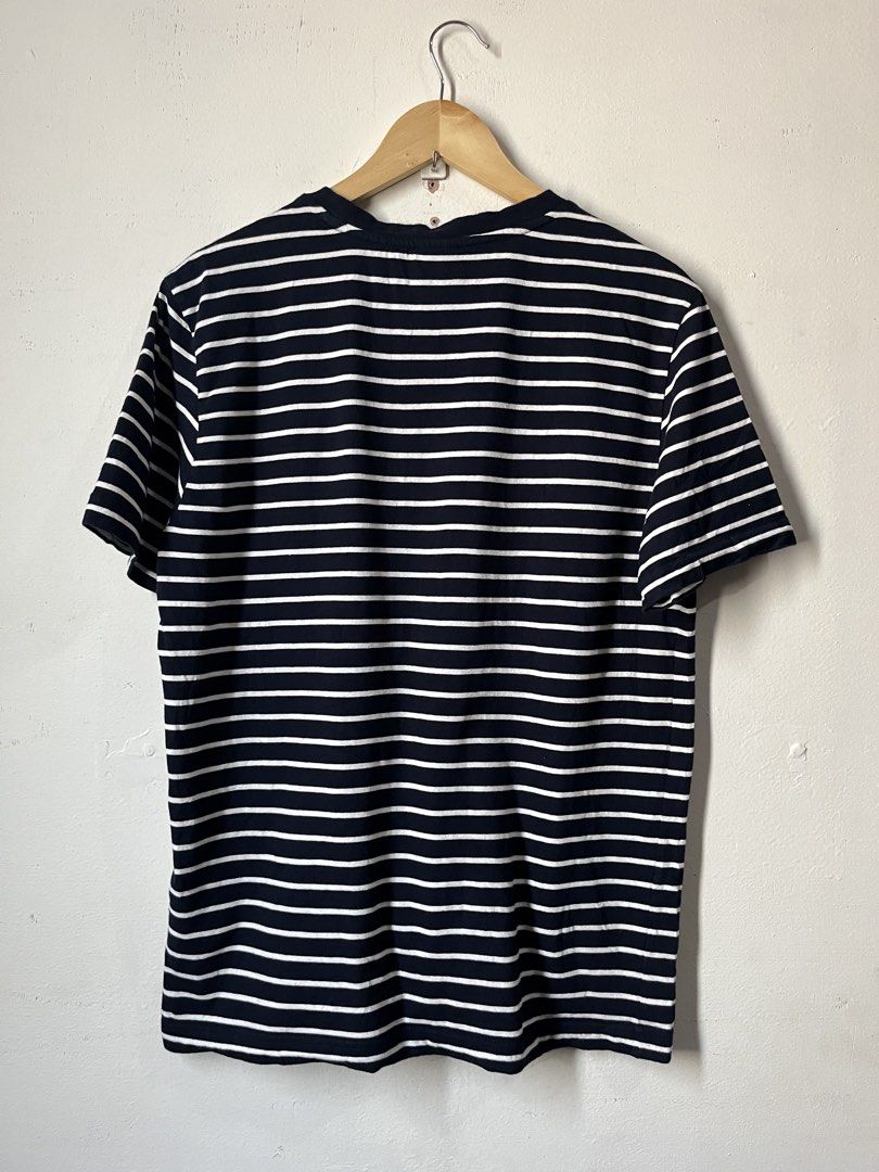 Kangol T-shirt (Category: Tshirts & Polo Shirts ) located in Cagayan de Oro. Submitted by vigo999 (Listing ID 1460153968, Image 2). Description: Kangol T-Shirt -Black and white striped short-sleeve T-shirt from Kangol featuring the brand’s kangaroo logo embroidered on the chest. Size L best fit Medium Condition: As new Color rate: 10/10 No issues Dimes: 21x27 .