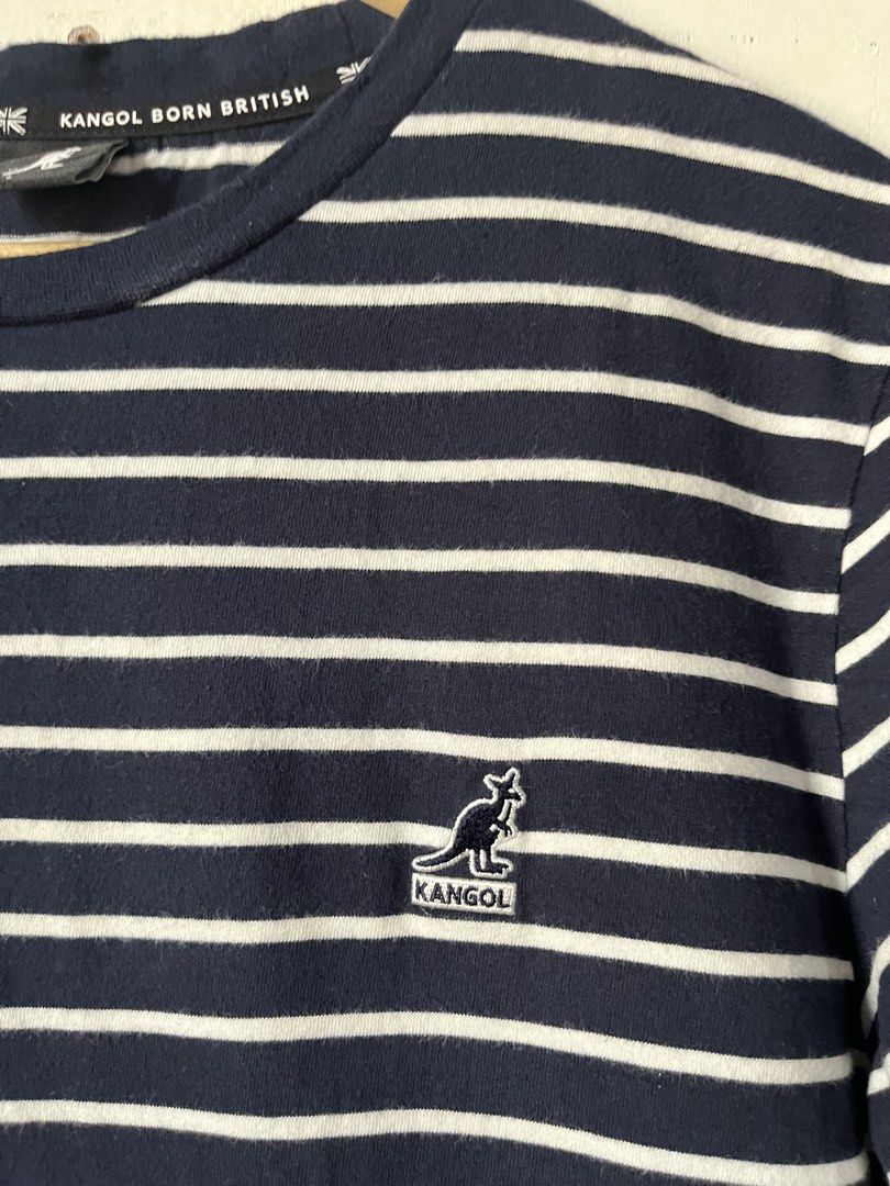 Kangol T-shirt (Category: Tshirts & Polo Shirts ) located in Cagayan de Oro. Submitted by vigo999 (Listing ID 1460153968, Image 3). Description: Kangol T-Shirt -Black and white striped short-sleeve T-shirt from Kangol featuring the brand’s kangaroo logo embroidered on the chest. Size L best fit Medium Condition: As new Color rate: 10/10 No issues Dimes: 21x27 .