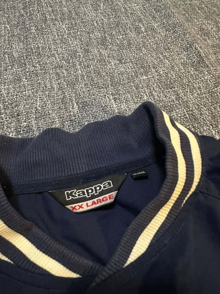 Kappa navy and red varsity-style jacket (Category: Coats, Jackets and Outerwear) located in Manila. Submitted by thriftedbykab (Listing ID 1460298520, Image 2). Description: ⚙️Size : Large 💎Condition: 10/10 🚨Color Rate: 10/10 🧨Issue: No ₱350.