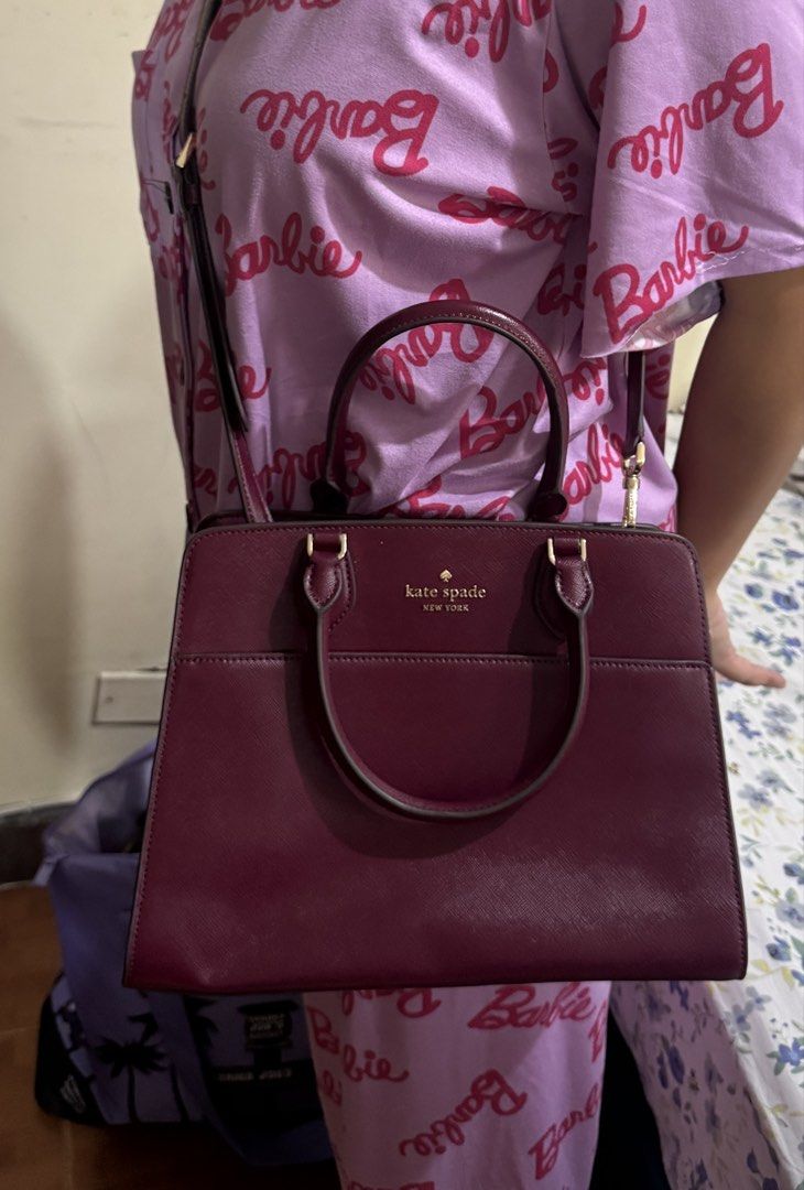 Kate Spade Madison Red Satchel Original (Category: Luxury Bags & Wallets) located in Manila. Submitted by feenpenguin6399 (Listing ID 1460067122, Image 3). Description: - Authentic Kate Spade Madison Satchel - Color: Deep Red - Dimensions: 8.5 inches (Height) x 11.5 inches (Width) - Price: PHP 1900.