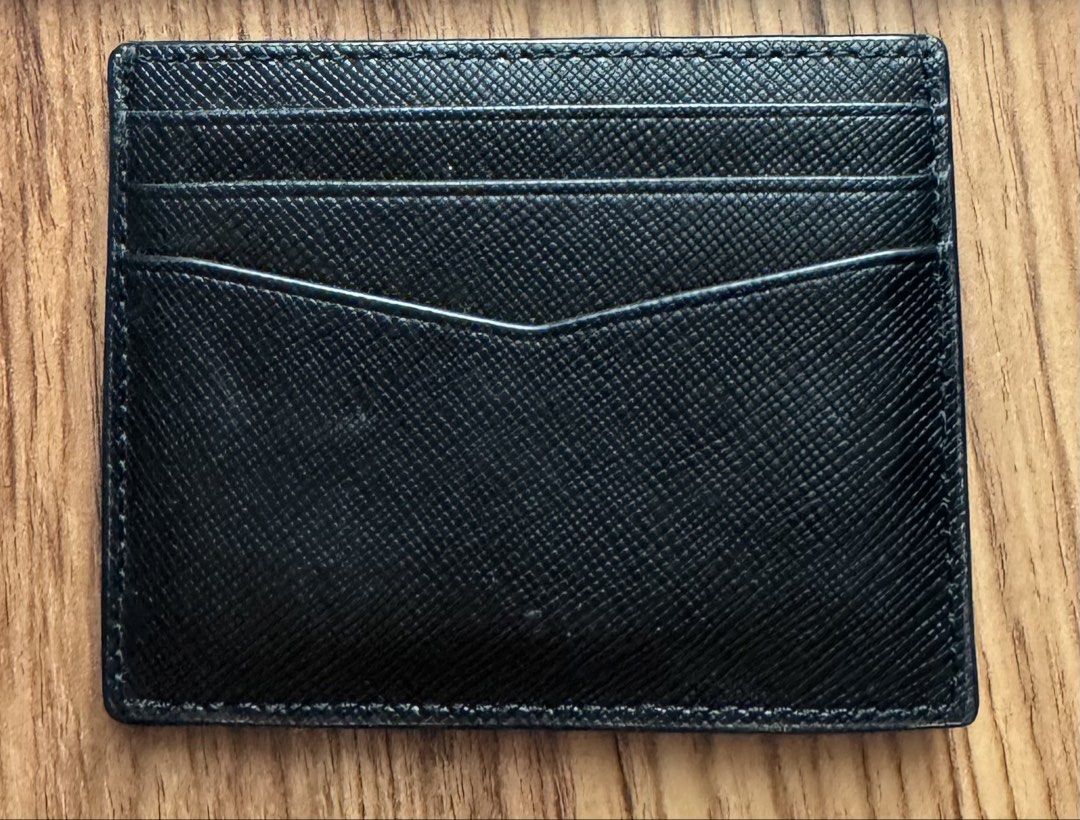 Kate Spade Small Slim Card Holder (Category: Wallets & Card holders) located in San Juan City. Submitted by namhani (Listing ID 1460169957, Image 2). Description: Classic Black Saffiano leather Kate Spade Staci small slim card holder finished with the brand's signature gold-tone pinmount logo. .