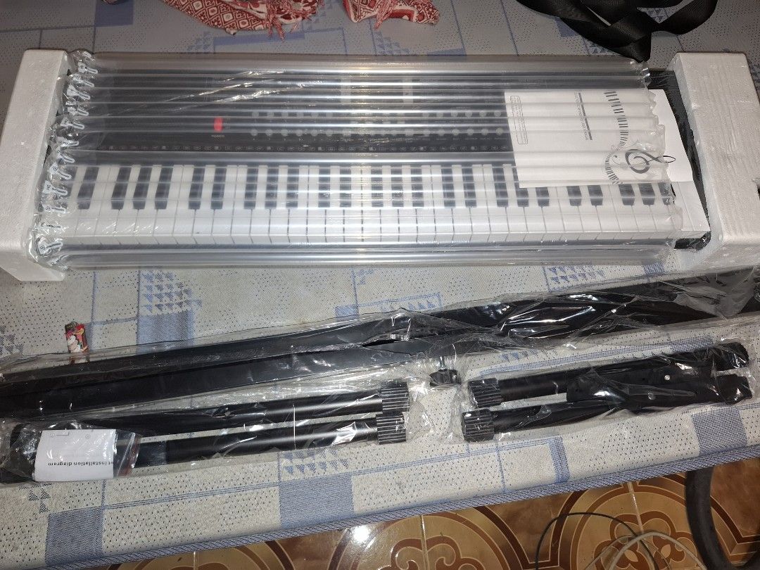 KAWES BD-663 88 Keys Electronic Keyboard with Stand (Category: Musical Instruments) located in Batangas. Submitted by carlothing (Listing ID 1460296933, Image 1). Description: - KAWES BD-663 Electronic Keyboard - 88 Keys - Includes Keyboard Stand - Includes Power Adapter - Includes Microphone - Brand New in Original Packaging - Ideal for Learning and Practice.