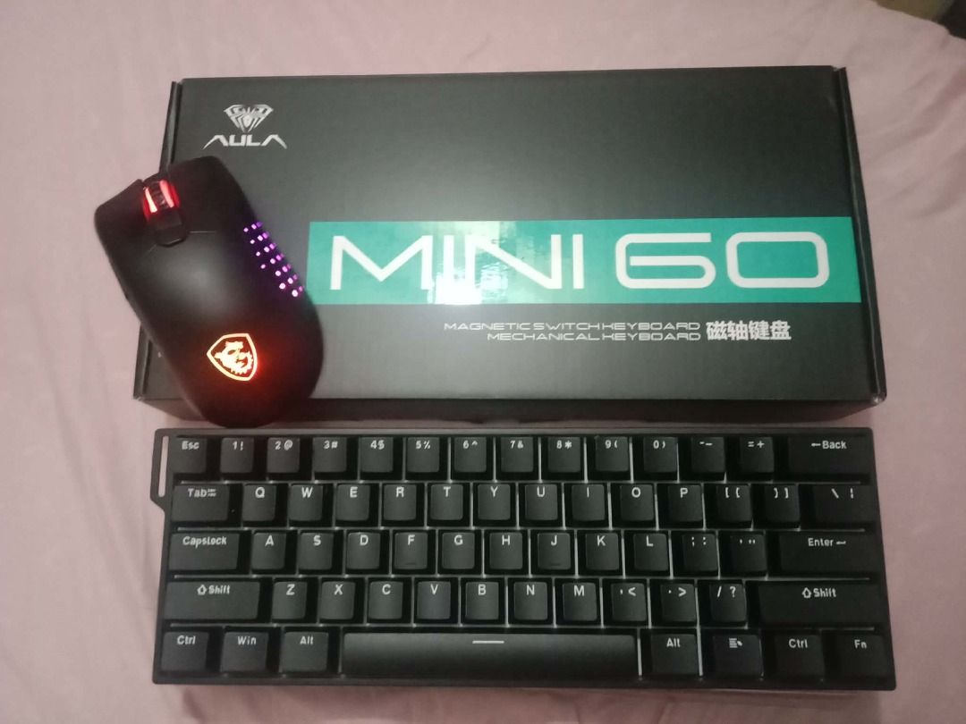 KEYBOARD AND MOUSE BUNDLE (Category: Computer Keyboard) located in Caloocan City. Submitted by masterenda19219 (Listing ID 1460131506, Image 1). Description: - AULA MINI 60 Mechanical Keyboard and Mouse Set (Black) tri mode (bluetooth, wired, usb dongle) - MSI Gaming Mouse tri mode (bluetooth, wired, usb dongle) no issues.