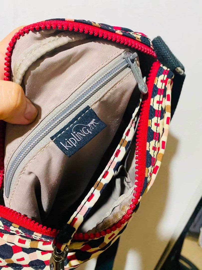 KIPLING Sling bag (Category: Luxury Bags & Wallets) located in Cagayan de Oro. Submitted by luxeyhn (Listing ID 1460146865, Image 2). Description: AUTHENTIC KIPLING in very good condition clean interior and exterior missing monkey only on.