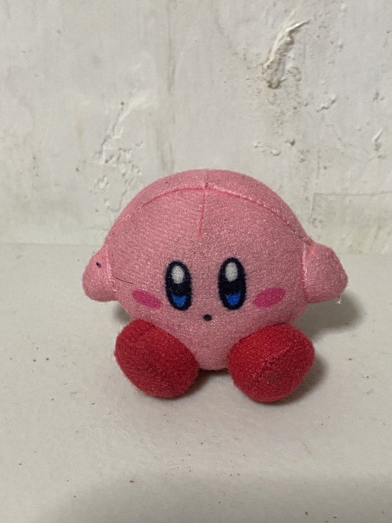 Kirby Plush Toy (Category: Plushies & Soft Toys) located in Manila. Submitted by kuya_moto (Listing ID 1460277899, Image 1). Description: - Adorable pink Kirby plush toy - Compact size, ideal for collecting or display - Features a small brown mark on the back - Original tag is still attached - A must-have for any Kirby enthusiast!.