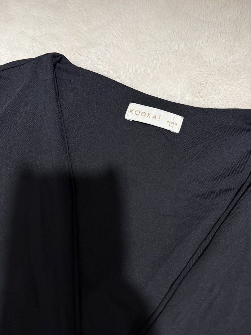Kookai Black Bodysuit | Size 1 (S) (Category: Others Tops) located in Manila. Submitted by meisu_mnl (Listing ID 1460215793, Image 3). Description: Kookai Black Bodysuit | Size 1 | Like New Like new ✨ Kookai • Size 1 Color: Black Bust: 28–36" Waist: 22–28" 🖤 Long sleeves 🖤 Deep V-neck 🖤 Inner support 🖤 Stretchy & fitted 🖤 Snap-button closure 🖤 Flattering silhouette Easy to style with jeans, skirts, trousers or shorts. Please check photos fo