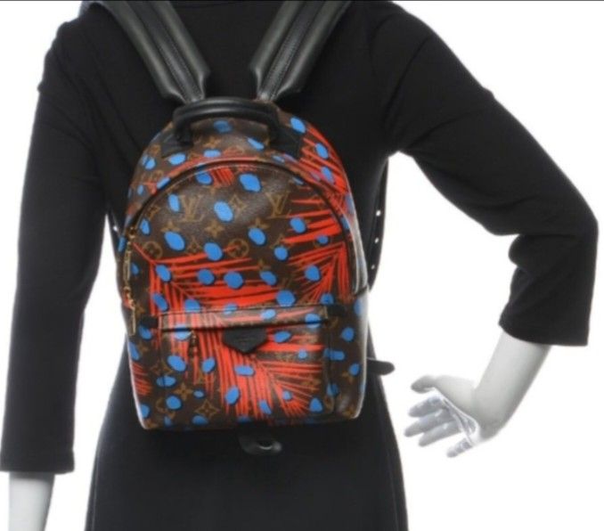 L 🤎V Palm❤️ Springs leather Mini Backpack (Category: Luxury Bags & Wallets) located in Manila. Submitted by eriiicaspage (Listing ID 1460216049, Image 1). Description: APREOWNED Lightly Used Iconic LV monogram Printed Leather Mini backpack Small Compact Sized ,Red ,blue - Unique red palm leaf and blue dot print - Genuine leather straps and handle - Convenient front zip pocket - Ideal for everyday adventures or getaways Sign of Used Cut ang leath