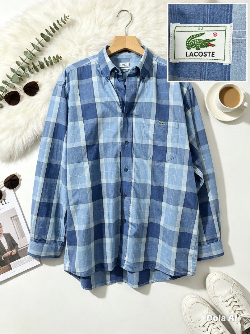 Lacoste Blue Plaid Button-Up Shirt (Category: Tshirts & Polo Shirts ) located in Manila. Submitted by momofunodos (Listing ID 1460175471, Image 1). Description: - Classic blue plaid button-up shirt from Lacoste - Iconic crocodile logo on chest pocket - Button-down collar - Versatile for casual or smart-casual outfits - Size: 42 DIMES: 26*30" ISSUE: LOST 1 BUTTON( TAAS) NOTE: BUY AT YOUR OWN RISK UKAY PO ETO KAU N BAHALA MG LEGIT ✅.