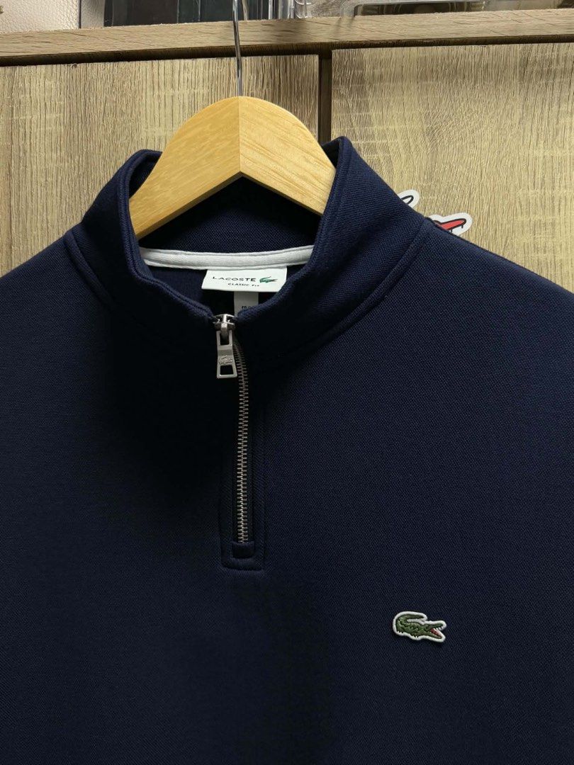 Lacoste Quarter Zip Sweatshirt (Category: Activewear) located in Cavite. Submitted by akeisha0412 (Listing ID 1460286345, Image 2). Description: Lacoste Quarter Zip SweatShirt Size Medium W-21 L-27 Brand New 4,000.
