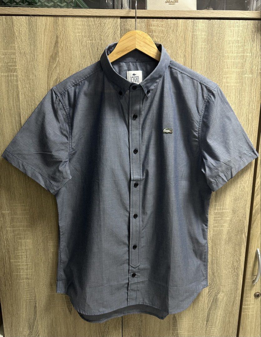 Lacoste LIVE Buttondown Polo (Category: Formal Shirts) located in Cavite. Submitted by PRIVATE.Selection (Listing ID 1460284316, Image 1). Description: Lacoste LIVE Buttondown Polo Size 42 fit large W 21.5 L 28 Good as new.