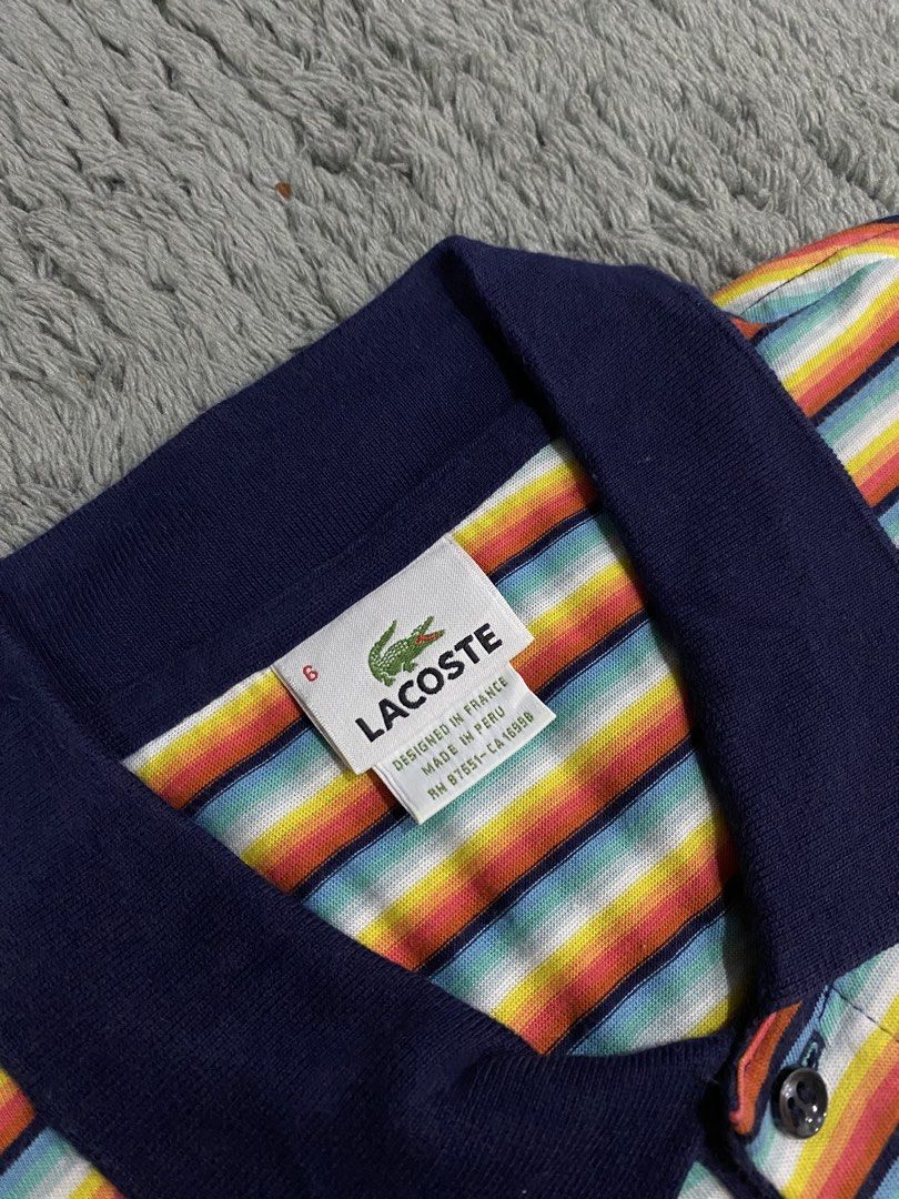 Lacoste polo shirt (Category: Formal Shirts) located in Leganes. Submitted by wisehandpick (Listing ID 1460139351, Image 2). Description: LACOSTE MULTI COLOR SHIRT (Authentic) Like new condition, no issue Complete Dimension 23 width 28 length Direct message please.