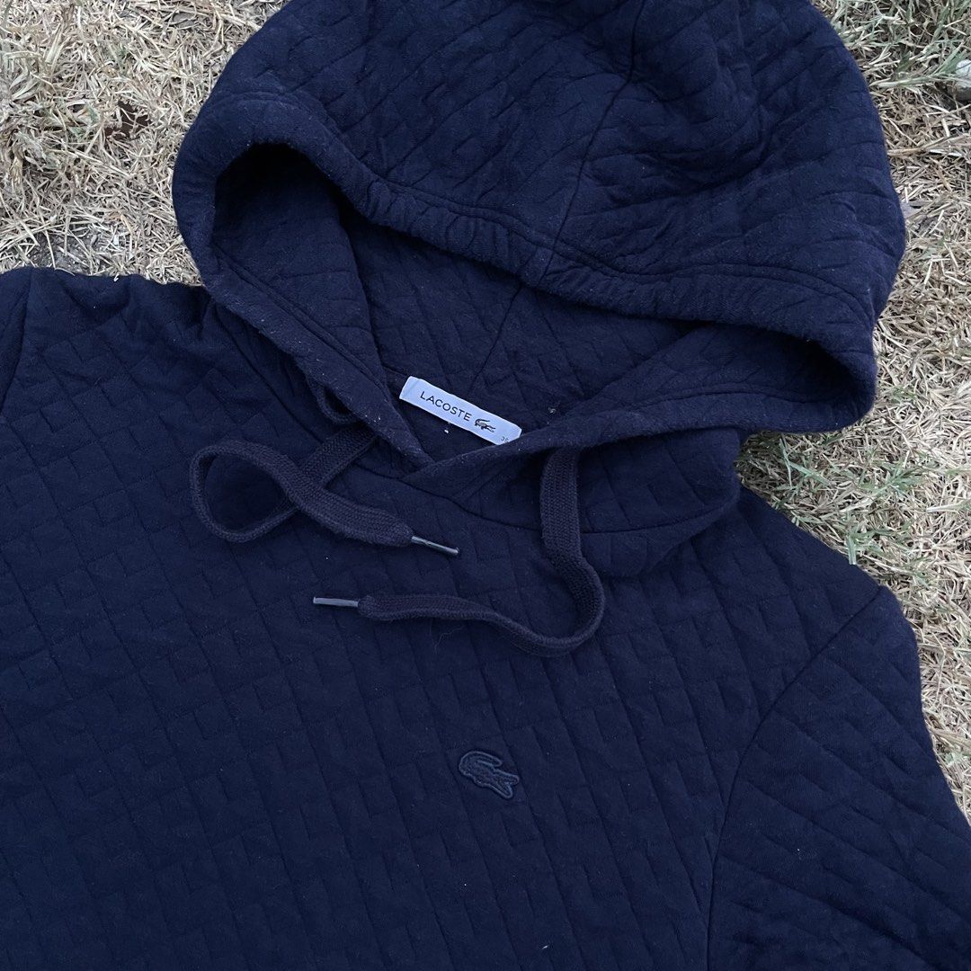 Lacoste Quilted Navy Blue Hoodie (Category: Coats, Jackets and Outerwear) located in Zamboanga. Submitted by selvege (Listing ID 1460109862, Image 2). Description: - Navy blue quilted hoodie from Lacoste - Kangaroo pocket and drawstring hood - Material: Cotton and Polyester blend - Size: 36 (fits UK 8-10) - Ideal for casual wear -dimes 20x26.5 -excellent condition -no issue.