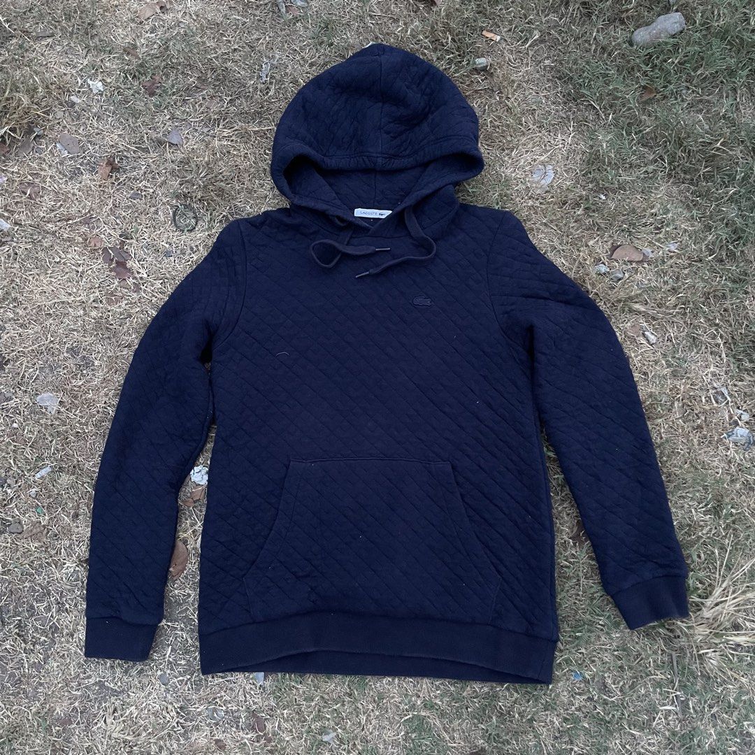 Lacoste Quilted Navy Blue Hoodie (Category: Coats, Jackets and Outerwear) located in Zamboanga. Submitted by selvege (Listing ID 1460109862, Image 1). Description: - Navy blue quilted hoodie from Lacoste - Kangaroo pocket and drawstring hood - Material: Cotton and Polyester blend - Size: 36 (fits UK 8-10) - Ideal for casual wear -dimes 20x26.5 -excellent condition -no issue.