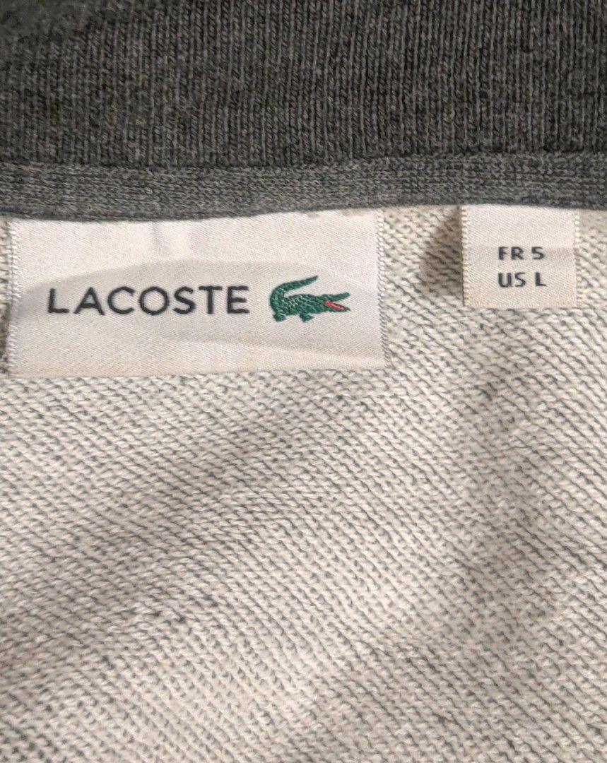 Lacoste Varsity Jacket (Category: Coats, Jackets and Outerwear) located in Bago City. Submitted by louielinco (Listing ID 1460221219, Image 2). Description: - Lacoste Varsity Jacket - Size: L - Snap button front closure - Two side pockets - Ribbed cuffs and hem with stripe detail - Small embroidered crocodile logo on chest.