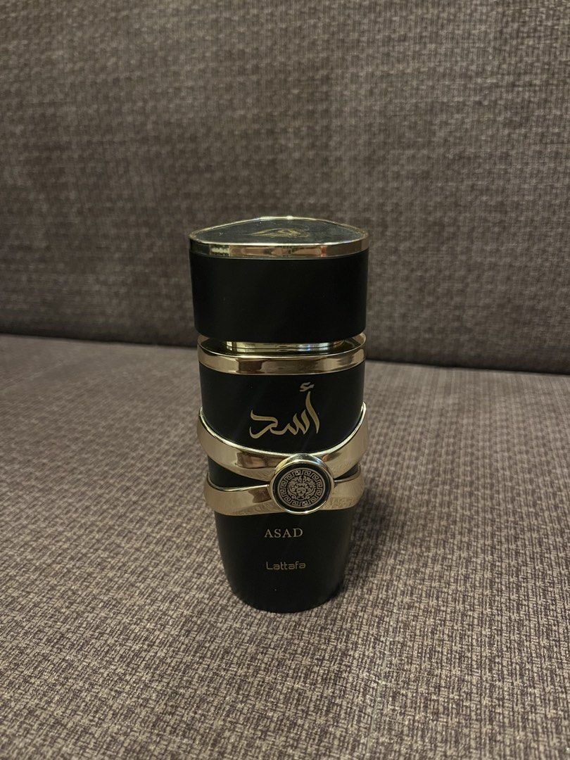 Lattafa Asad Eau de Parfum for Men (Category: Fragrance & Deodorants) located in Manila. Submitted by lowkeyxan (Listing ID 1460235716, Image 1). Description: - Lattafa Asad Eau de Parfum - Designed for men - Features a sleek black bottle with gold accents - Arabic script detailing on the front - Highly praised and great scent profile - Selling because it's no longer needed.