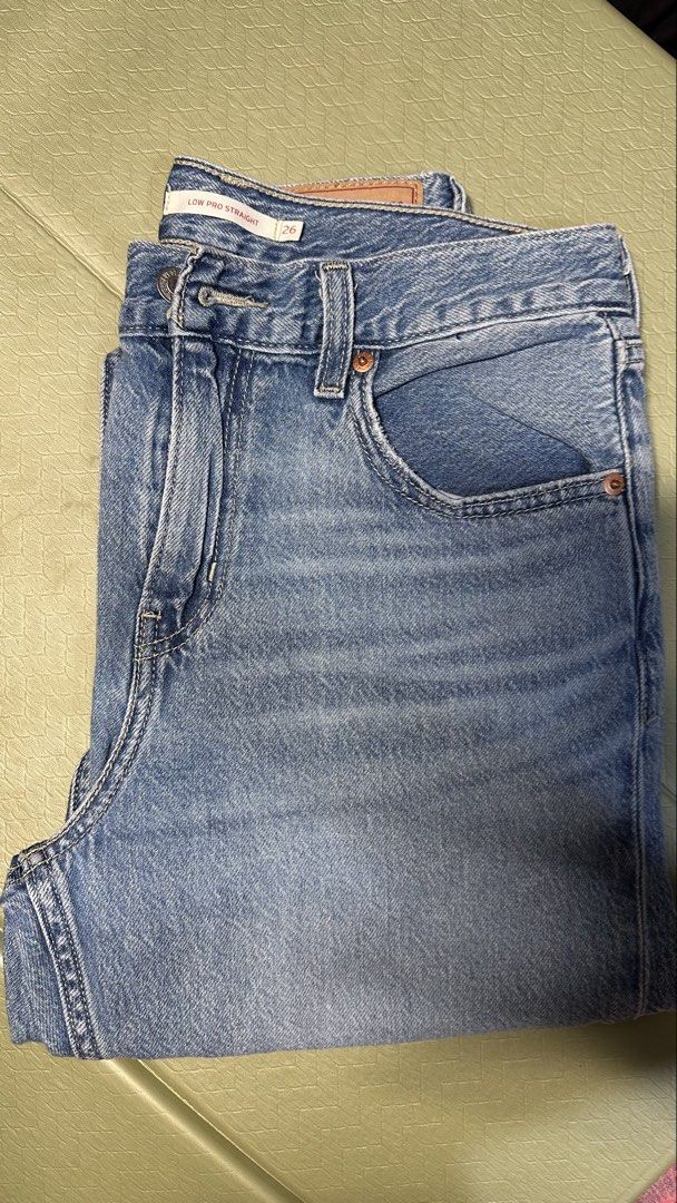 Levi's Low Pro Straight Jeans Size 26 (Category: Jeans) located in San Pedro. Submitted by laizaanne (Listing ID 1460254842, Image 1). Description: - Classic blue Levi's jeans - Low pro straight fit - Size 26 - Versatile staple for any wardrobe - Easy to style up or down.