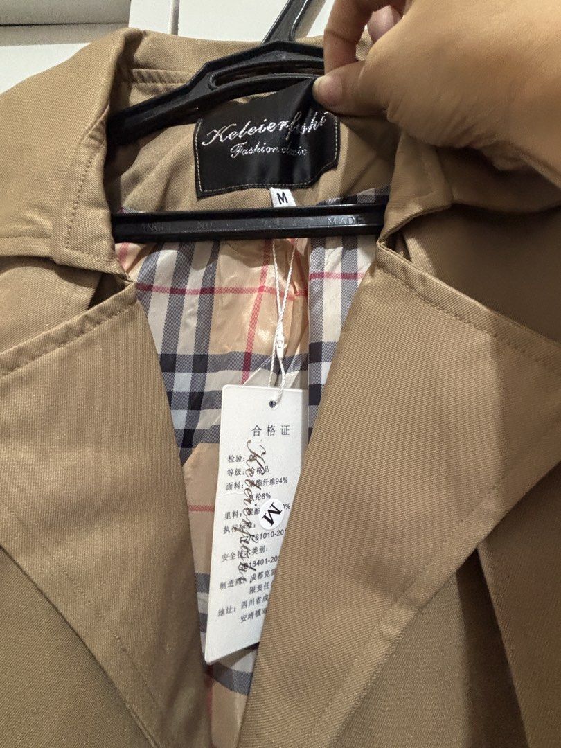 Light brown coat (Category: Coats, Jackets and Outerwear) located in Pasay City. Submitted by l0cky (Listing ID 1460222803, Image 2). Description: Bnew size 7.