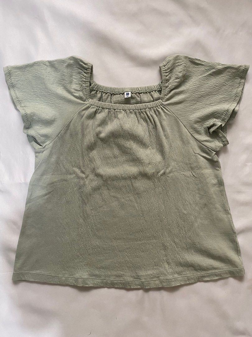 Light Green Textured Top (Category: Blouses) located in Las Pinas. Submitted by shairaadriannx (Listing ID 1460135999, Image 1). Description: - Light green top with a textured fabric. - Elasticated hem for a comfortable fit. - Ideal for casual outings..
