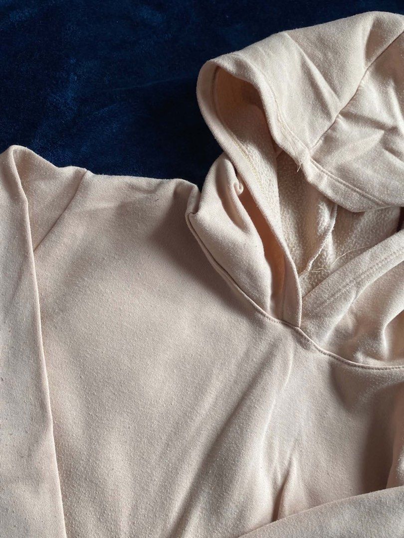 Light Orange Hoodie with Pocket (Category: Coats, Jackets and Outerwear) located in Manila. Submitted by lesjury (Listing ID 1460221908, Image 2). Description: - Comfy light orange hoodie - Features a front pocket and hood - Made from soft material - Perfect for casual everyday wear - Easy to style with jeans or leggings - RFS: Do not want it anymore.