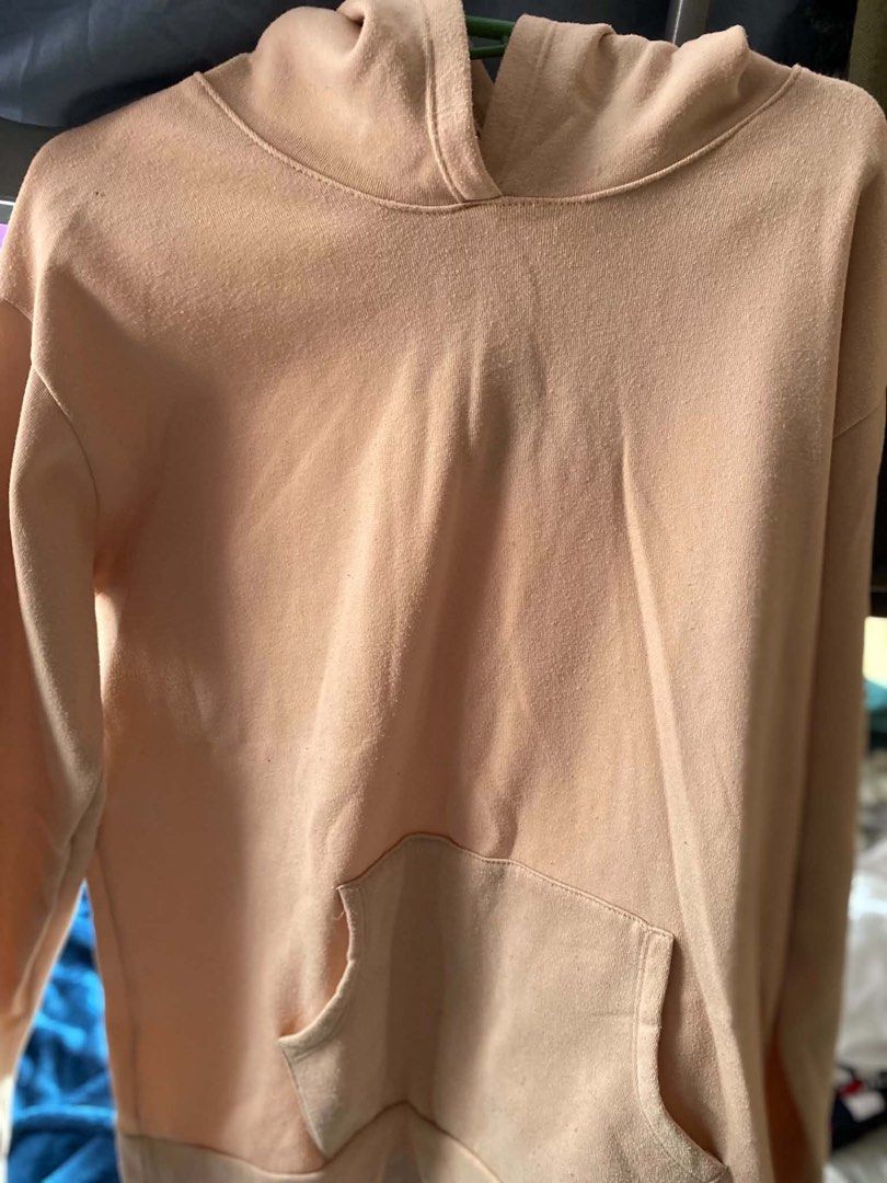 Light Orange Hoodie with Pocket (Category: Coats, Jackets and Outerwear) located in Manila. Submitted by lesjury (Listing ID 1460221908, Image 3). Description: - Comfy light orange hoodie - Features a front pocket and hood - Made from soft material - Perfect for casual everyday wear - Easy to style with jeans or leggings - RFS: Do not want it anymore.