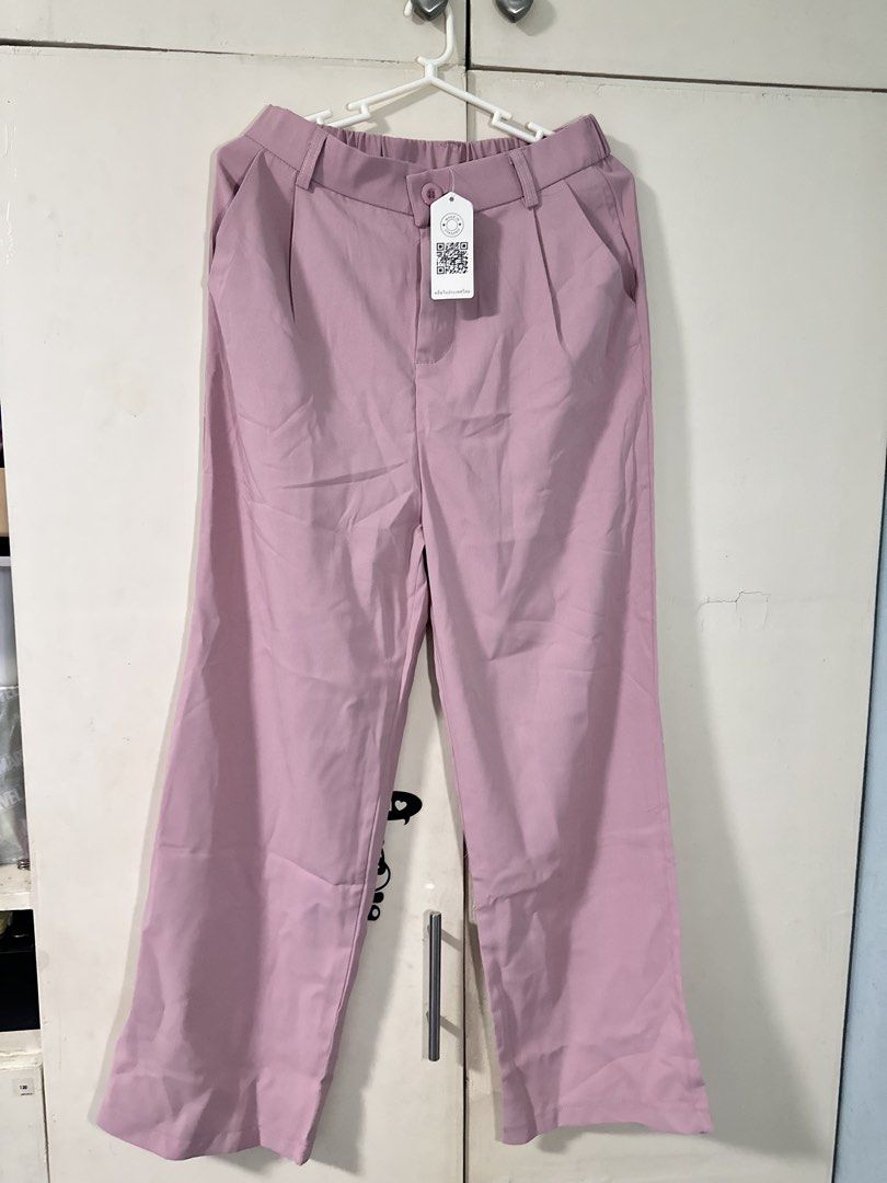 Light Pink Wide Leg Pants (Category: Other Bottoms) located in Quezon City. Submitted by bentabelles (Listing ID 1460256987, Image 2). Description: - Chic light pink wide-leg pants - Comfortable elastic waistband at the back - Two functional front pockets - Elegant pleated detail - Versatile for casual or dressy occasions - Effortless to style.