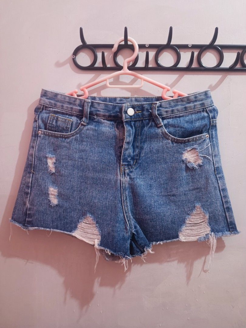 Light Wash Distressed Denim Shorts (Category: Shorts) located in Manila. Submitted by essarazas (Listing ID 1460193640, Image 3). Description: Cute light wash denim shorts. Features a distressed hem and some rips. Button fly closure. Great for casual wear. Easy to pair with any top. Grab these comfy shorts now..