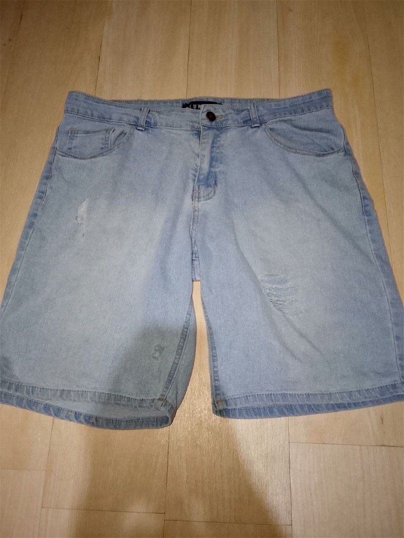 Light Wash Distressed Denim Shorts (Category: Jeans) located in Pasay City. Submitted by zvrinana (Listing ID 1460280434, Image 1). Description: - Light wash denim shorts - Distressed details and rips on the front - Classic five-pocket style - Button and zip closure - Comfortable for everyday wear - Great for warmer weather.