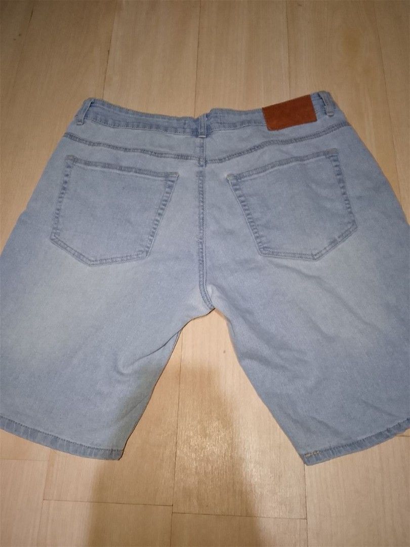 Light Wash Distressed Denim Shorts (Category: Jeans) located in Pasay City. Submitted by zvrinana (Listing ID 1460280434, Image 2). Description: - Light wash denim shorts - Distressed details and rips on the front - Classic five-pocket style - Button and zip closure - Comfortable for everyday wear - Great for warmer weather.