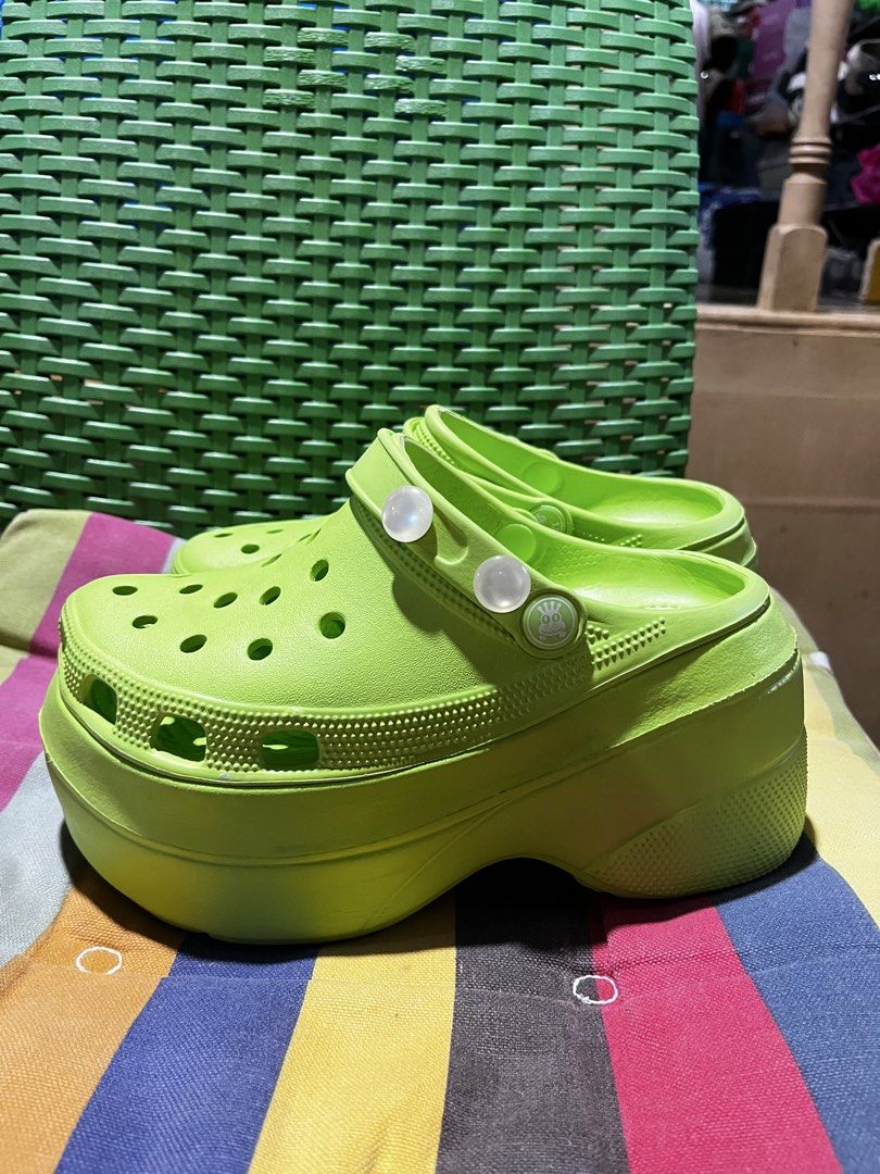 Lime Green Platform Crocs Clogs (Category: Slippers and slides) located in Davao. Submitted by wornbycathy (Listing ID 1460300504, Image 2). Description: Super bright lime green platform Crocs. These have a chunky sole for extra height. Easy to slip on and off. Great for casual wear or festivals. Get these fun clogs now!.