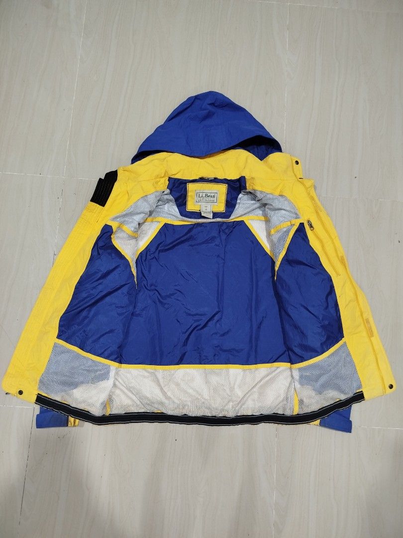 l.l.bean Colorblock Gorpcore Jacket (Category: Coats, Jackets and Outerwear) located in Aroroy. Submitted by dr0p-a-dr1p (Listing ID 1460250443, Image 3). Description: Width: 21 Length: 27 - Classic L.L.Bean colorblock jacket - Striking blue and yellow design - Features a convenient hood - Ideal for outdoor adventures and everyday casual wear - Crafted with durable, quality materials - Size Small (S) - Ready for its next journey!.
